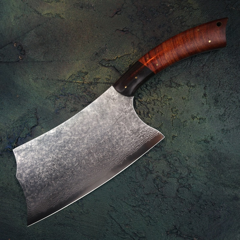 Close up of the full view of the Chinese Butchers Cleaver made with VG10 Japanese steel with a red acid wood handle on a dark surface 