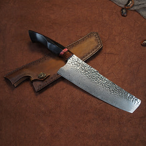 Top view of Japanese Nakiri Damascus steel knife with sheath 