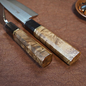 Close up  of the Handmade figured sycamore burl wood handle Japanese Deba Fish knife